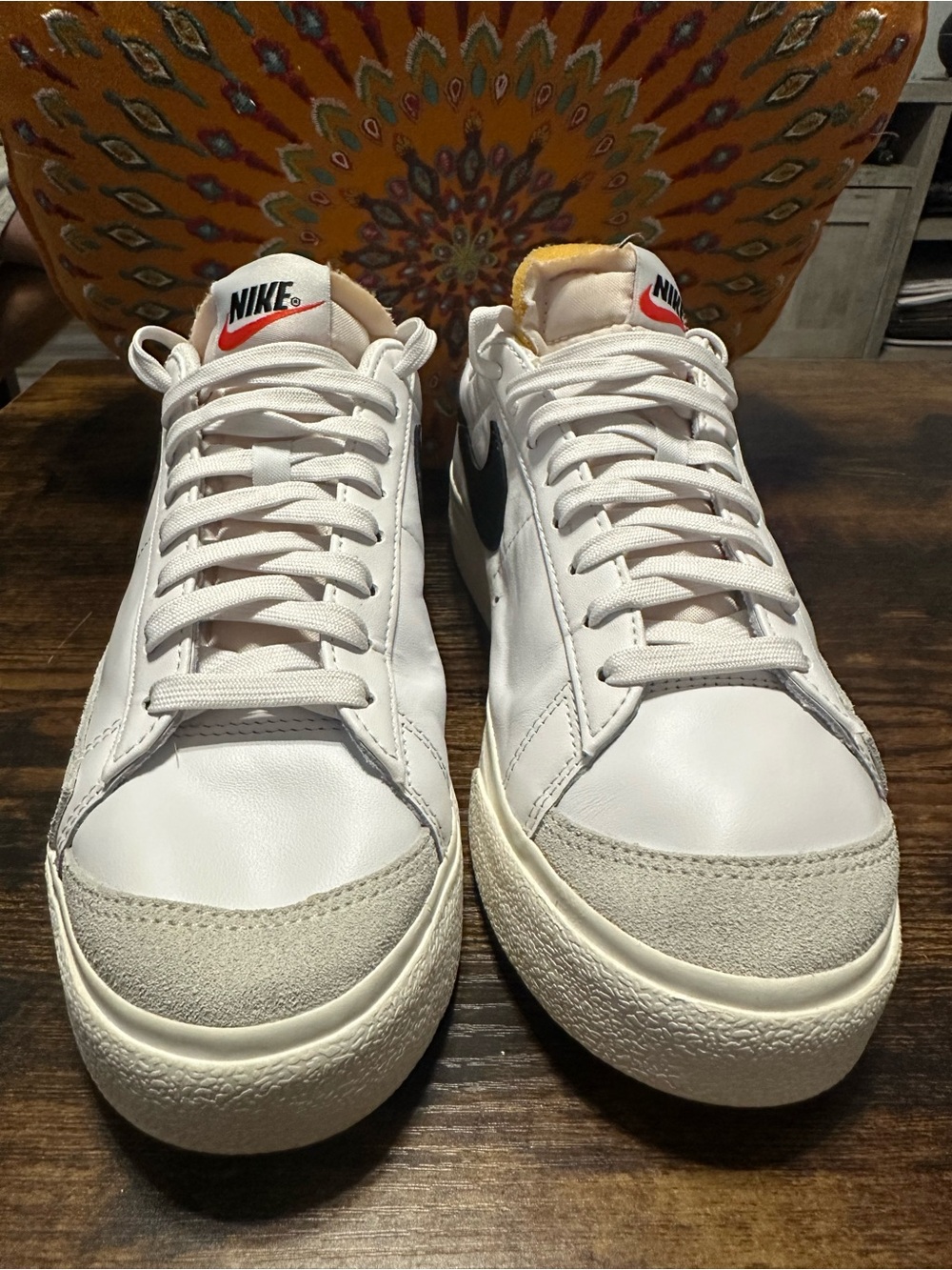 Nike Men’s White Leather Sneakers with Black Swoosh and Red Logo